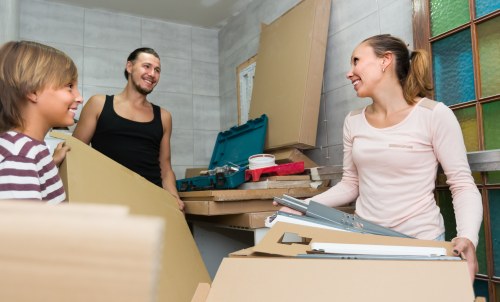 Moving van and packed boxes outside a Stockwell flat