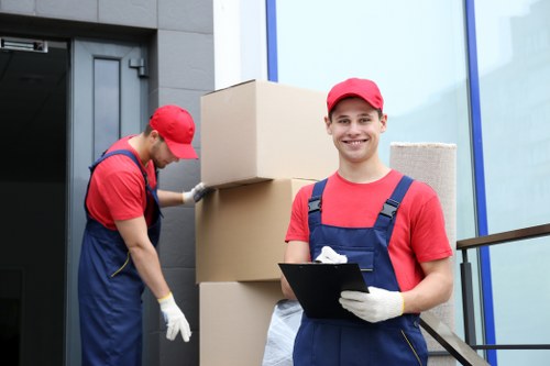 Movers preparing a Stockwell home relocation with careful packing