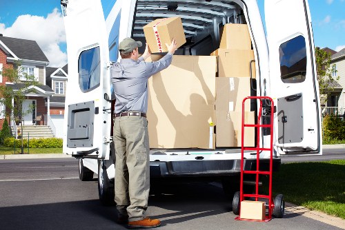 Careful wrapping of fragile household items during a Stockwell packing service