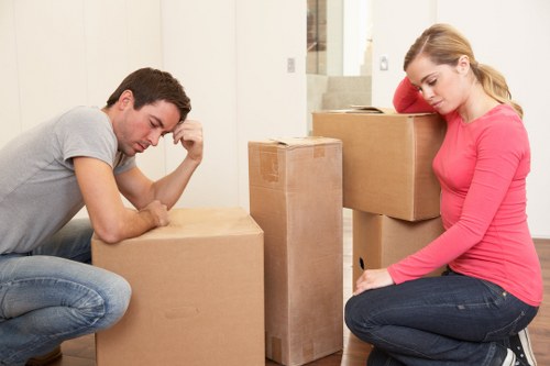 Packed household items and moving vehicle ready for transport