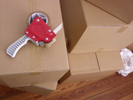 Professional movers handling fragile belongings during a Stockwell move